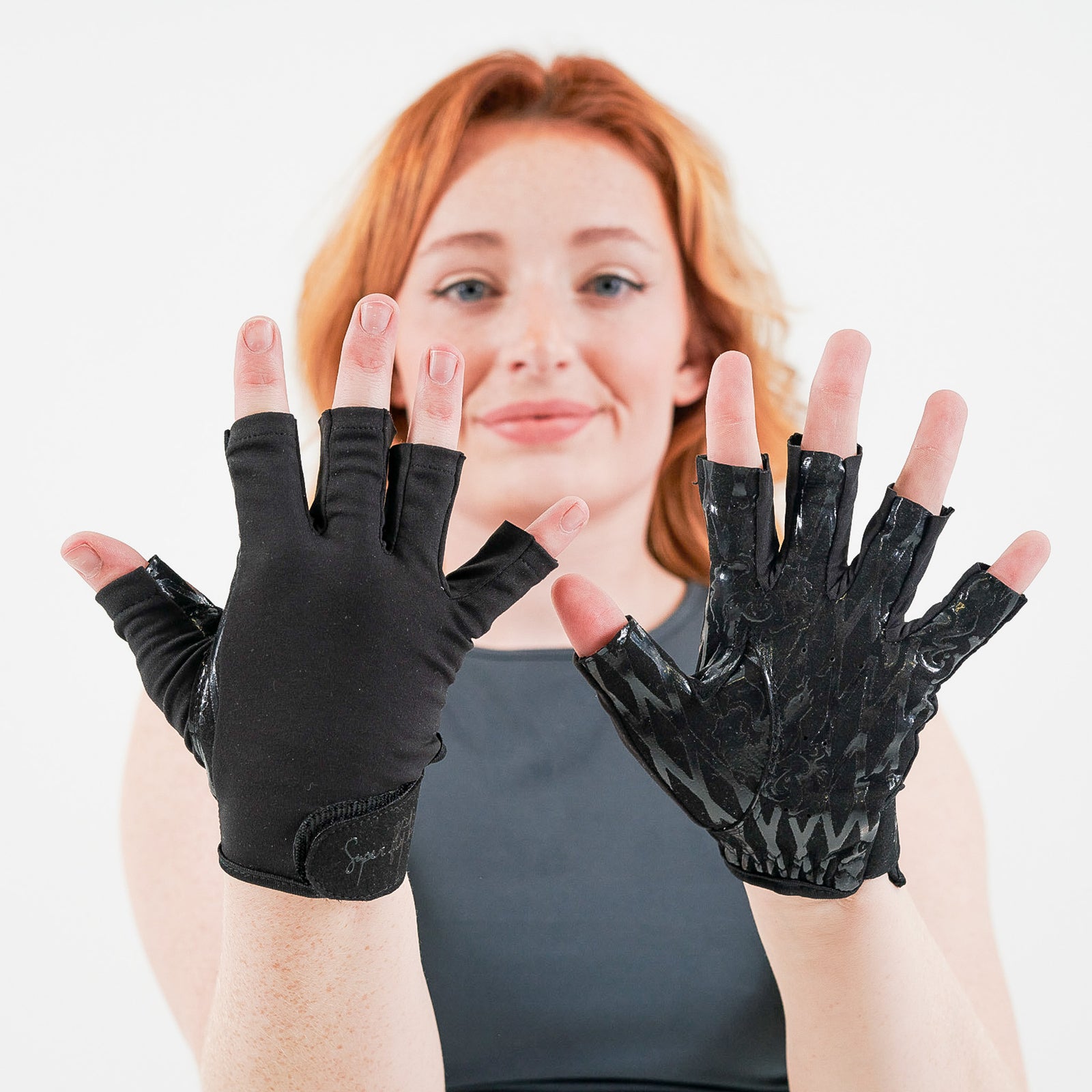 pole dancer wearing sticky polewear gloves in flex fishnet print midnight black colour